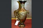 Chinese bronze patinated baluster vase with relief moulding and elephant handles