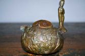 20th Century Tibetan/Chinese highly decorated bronze ceremonial wine pot, c1960